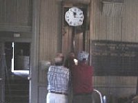 Bill Edwards and Byron White hanging Bill's large Regulator.