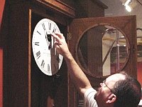 Chapter 124 Past President Chuck Edwards sets the time on a large Self Winding Clock Company Clock. SWCC clocks were used in most railroad depots. They were synchronized from a central time source (the Navy Observatory) so were very accurate.