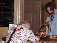 oe Veneziano teaches a young visitor and his Father about the Morse code and the telegraph.