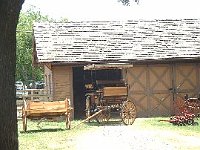 An old wagon and other farm equipment is on display at the Park.