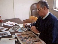 Gary Mowery at work on a New Haven painting to simulate a decal.