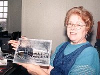 Annette White with a famous Currier & Ives winter scene.