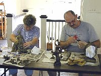 Robert and Donna Tramel work on their pieces.