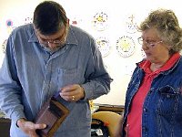 Paul Rabe struggles with his problem. Instructor Bonita Spivey watches and advises.