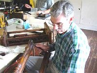 Dan Cole is assessing his Vienna style clock case after cleaning it with naphtha. Dan had to determine if he should remove the old finish or not. He decided that he would.