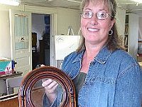 This particular clock case, proudly shown off by Vicki Zakin, had a finish that been subjected to environmental extremes. With some TLC and sweat a beautiful rosewood veneer was revealed.