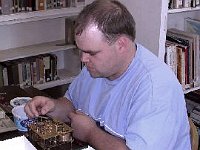 Corey Stratton is assembling the levers on the front plate....Does he look worried?