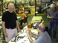 Dee Koch, Michael Corolla & Earl Wilson.  It looks like Michael is explaining something to Dee.