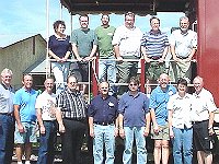 (Left to Right) Top Row: Evelyn Slough, Kris Gallagher, Steve Skrasek, Mike Manual, Tom Brown and John Lewandowski.  Bottom Row: James Sanford, Bruce Wooldridge (Helper), Tom Wykes (Helper),  John Erickson. Bela Marton, Richard Prusha, Phil Ball (Instructor), Pat Holloway and Jay Holloway.