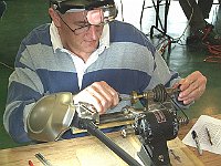 George Barson performing drilling operation on his brass sanding wheel project prior to tapping.