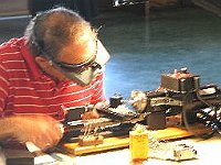 Bruce Wooldridge making a steel die holder using his boring cutter made in class.