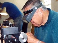 Bob May is polishing his die holder that he made in the Sherline.