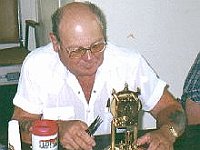 George Karas adjusts his clock.