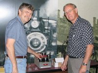 Clinton Kleen & Robert Connell are cleaning their pocket watch parts in the ultrasonic cleaning machine.  What looks like a steam engine train bearing down on them in the background is actually a print on the wall in the Founder's Building!  In these photos, you will see several of these prints.