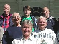 (Left to Righr)  Back row:  Larry Grubbs, Garland Peters, Len Kaufman, Gary Mowery.  Front row:   Dan Tips, Al Kulakoff, Gerald Lacy, and Stan Lunday. The instructor Fred Tischler is in front of the group.  This class covered movement fundamentals with lots of hands on repair procedures for American & European spring barrel, time and strike movements (non-French) with count wheel or rack/snail strike mechanism.