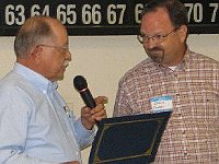 President Bill Edwards presents Past President Chuck Edwards a lifetime membership in Lone Star Chapter 124.