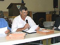 2005 Secretary/Treasurer Bill Andrle reading the minutes of the previous meeting. Bill also gave a complete financial report. 2005 President Bill Edwards and 2005 Convention Director Phil Ball follow the handout containing the information.