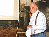 Bill Edwards was the chairman of the street clock restoration committee.  In this photo, Bill discusses some of the challenges in getting the clock restored.