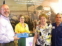 Byron and Annette White received a gift from the Chapter as thanks for donating the Street Clock.  Byron and Annette also worked with the City of Grapevine and the Grapevine Historical Planning head in securing a place for the clock.  The clock will be installed and unveiled in September.   Phil Ball made the presentation