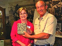 Vice President Bruce Wooldridge presented Pam with a gift from the Chapter.  Pam served as President for 2 years.