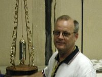 Sometimes it just doesn't seem fair. This fellow is on a different plane from the rest of us. Every year he brings home blue ribbons from the crafts competition. His work is so incredible!  Here he is shown with his blue ribbon winning tall Torsion Pendulum Clock. (the movement is not shown in the photo). The clock was entered in "Decorative Metal Parts".  Congratulations to Chapter 124 member Richard Cox. We are all proud of you!