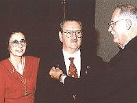 Nick Bonura also received the "Star Fellow" award. Nick was the general chairman of the 2001 National. He is shown receiving the pin from NAWCC President George Orr. Nick's wife Judy shares in the joyous occasion.