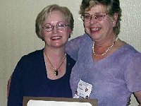 Chapter 124 member Pam Tischler (on the left) is shown after receiving the "Fellow" award. Shown with Pam is NAWCC Board Chairperson Judy Draucker.