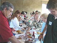 The Chapter provided Texas barbeque and the attendees each brought an additional dish of salads, vegetables, or deserts.