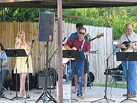 The music group is composed of Russ playing mandolin (plus a couple of other instruments), John Stenger on guitar with a beautiful tenor voice, Stephen Stenger on bass guitar, Sarah Stenger and Claire Smith.  The music covered a wide range from oldies, to the Beatles, gospel music and bluegrass variety for all of us.